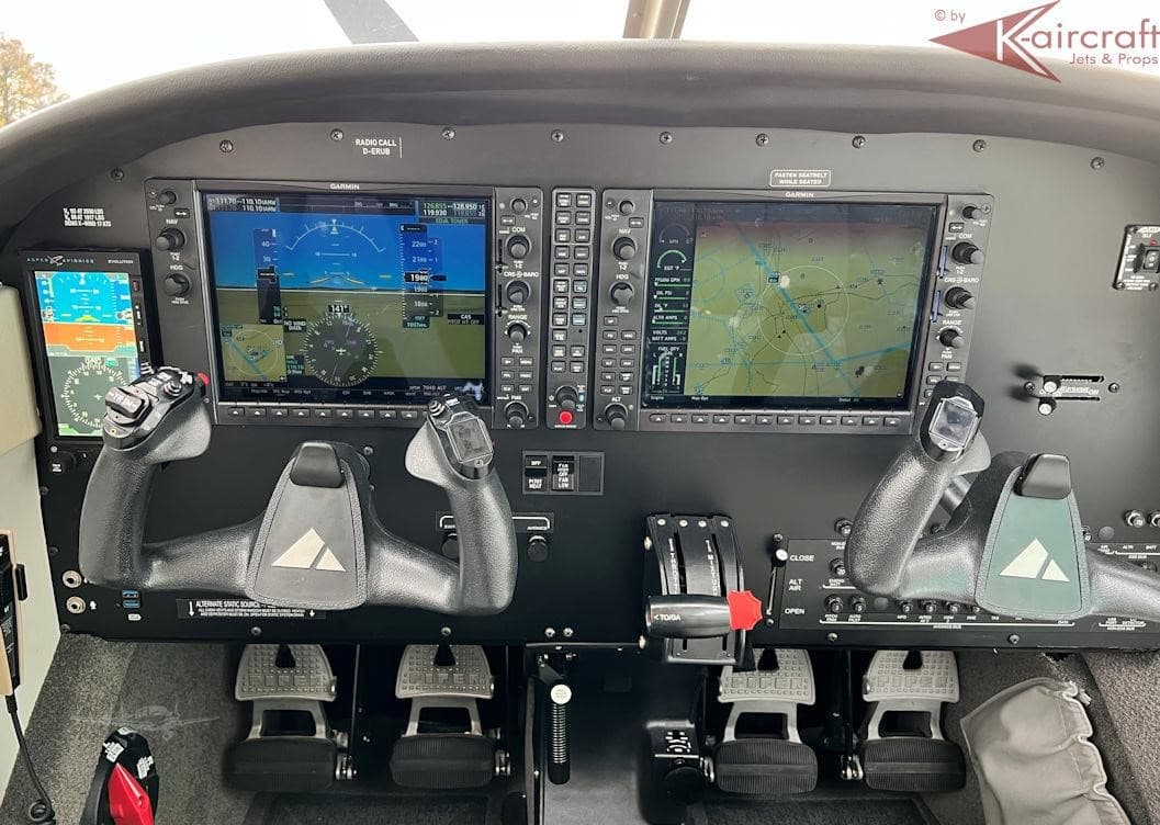 Piper Archer G-GOST cockpit with displays on