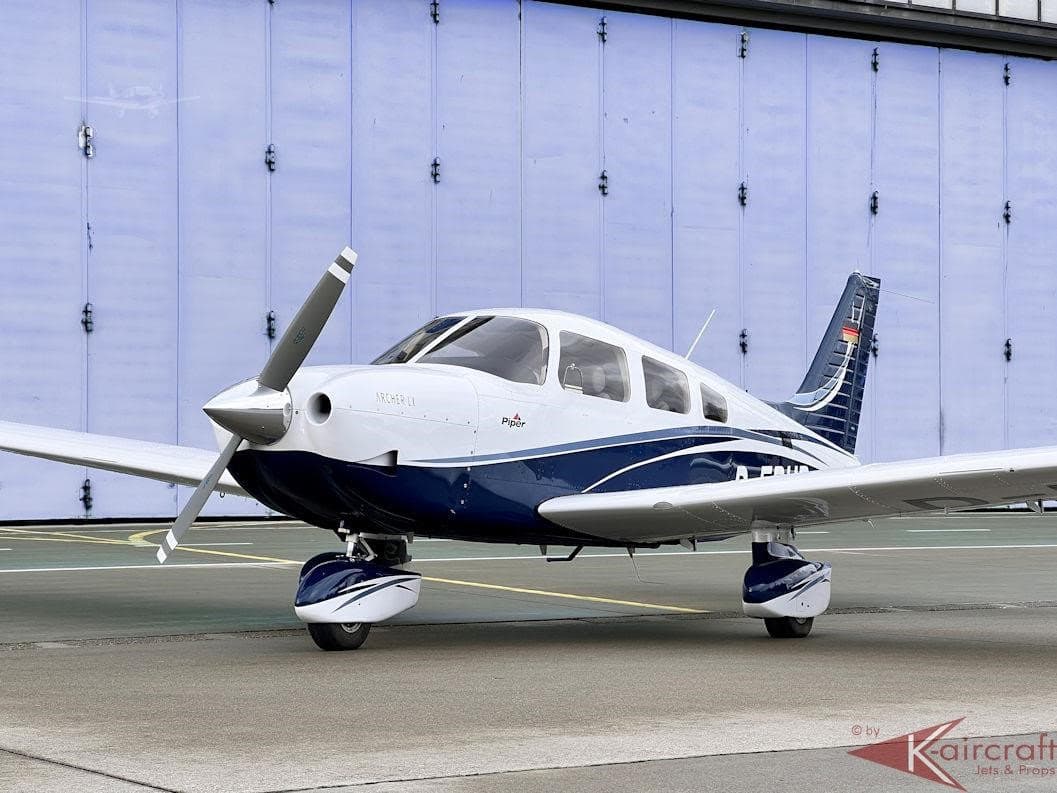 Piper Archer G-GOST front left view